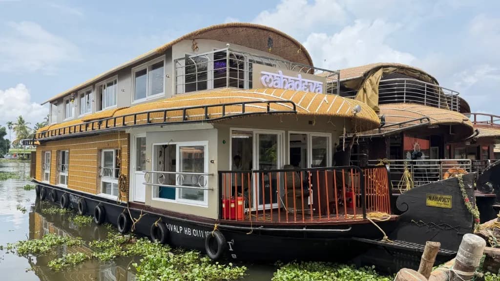 Mahadeva premium luxury flagship houseboat front view floating on Kerala waters