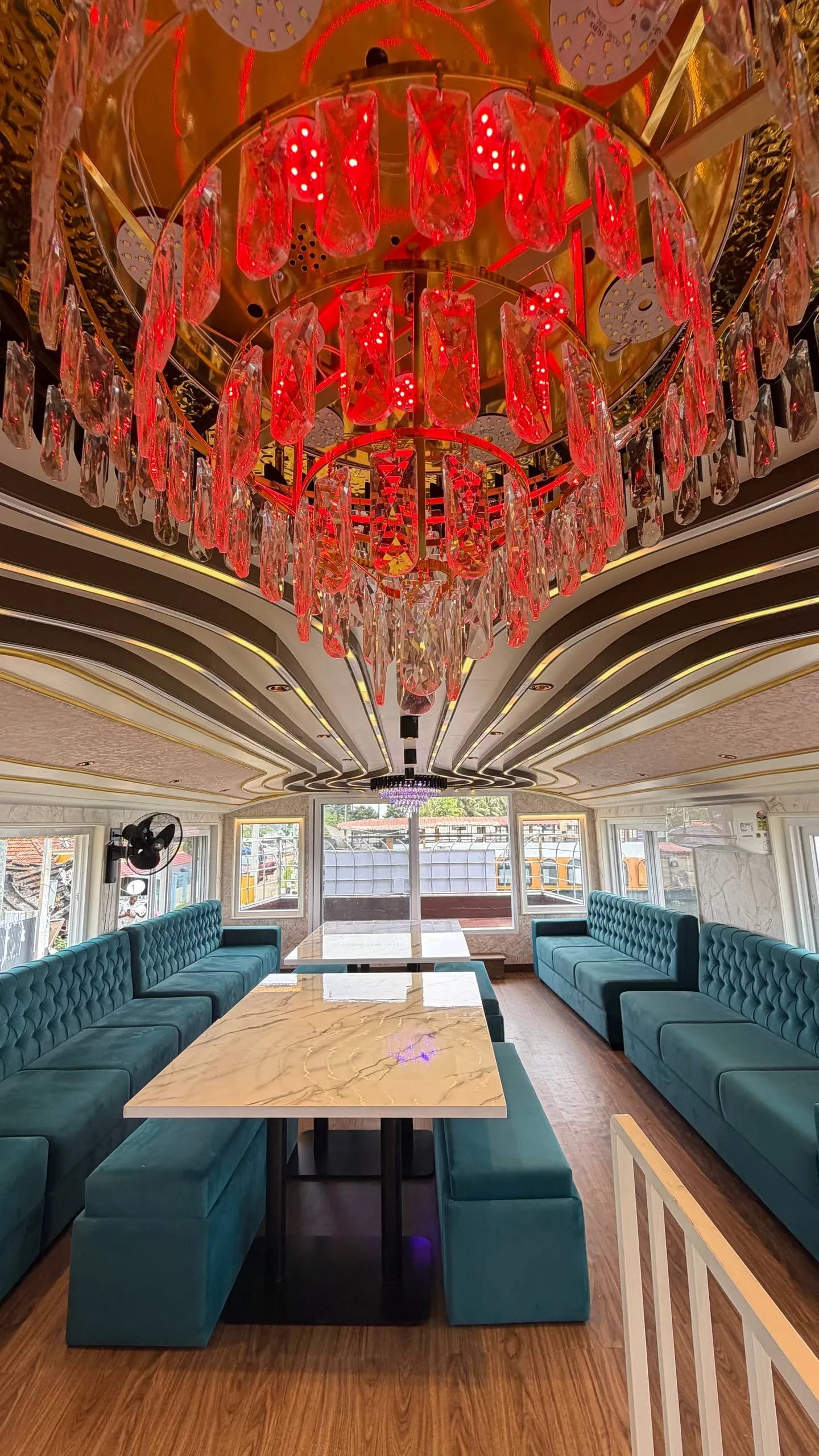 Panoramic lounge area on the air-conditioned upper deck of Mahadeva