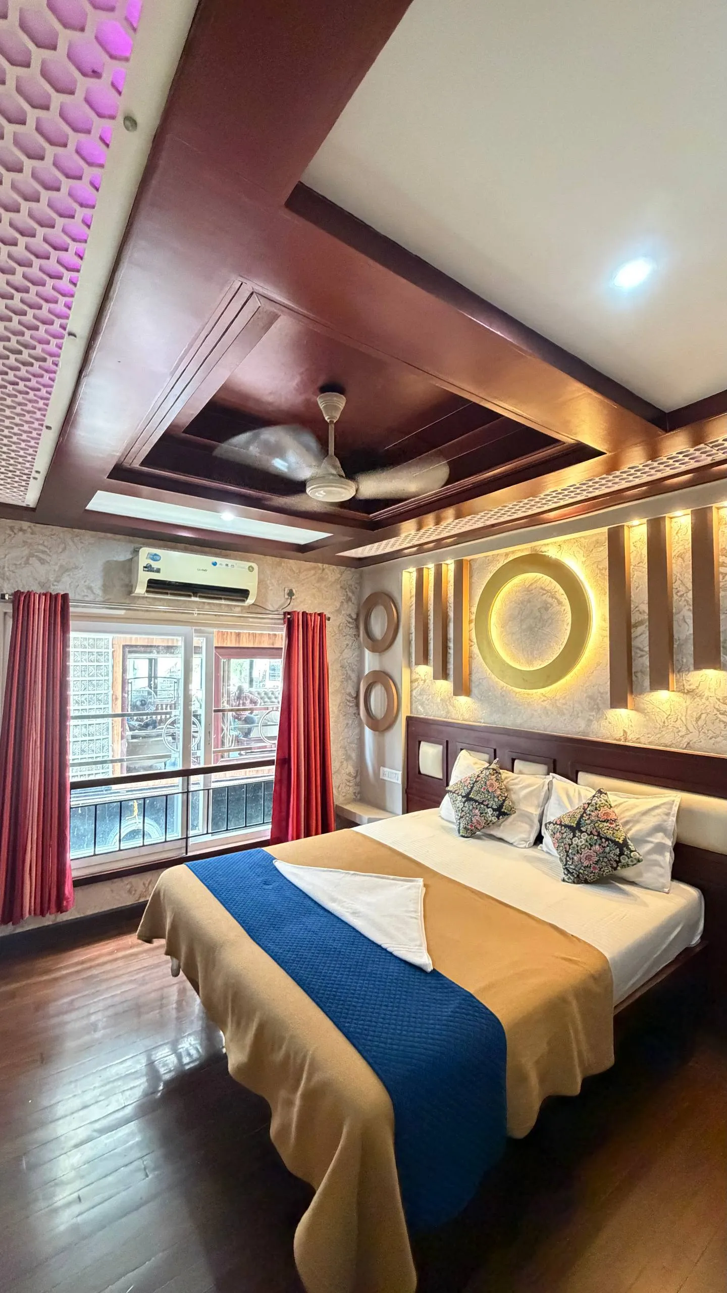 Third comfortable air-conditioned bedroom with premium bedding on Vinayaka